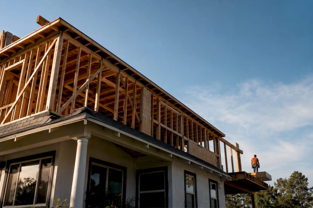 Second story addition framing above Los Angeles home