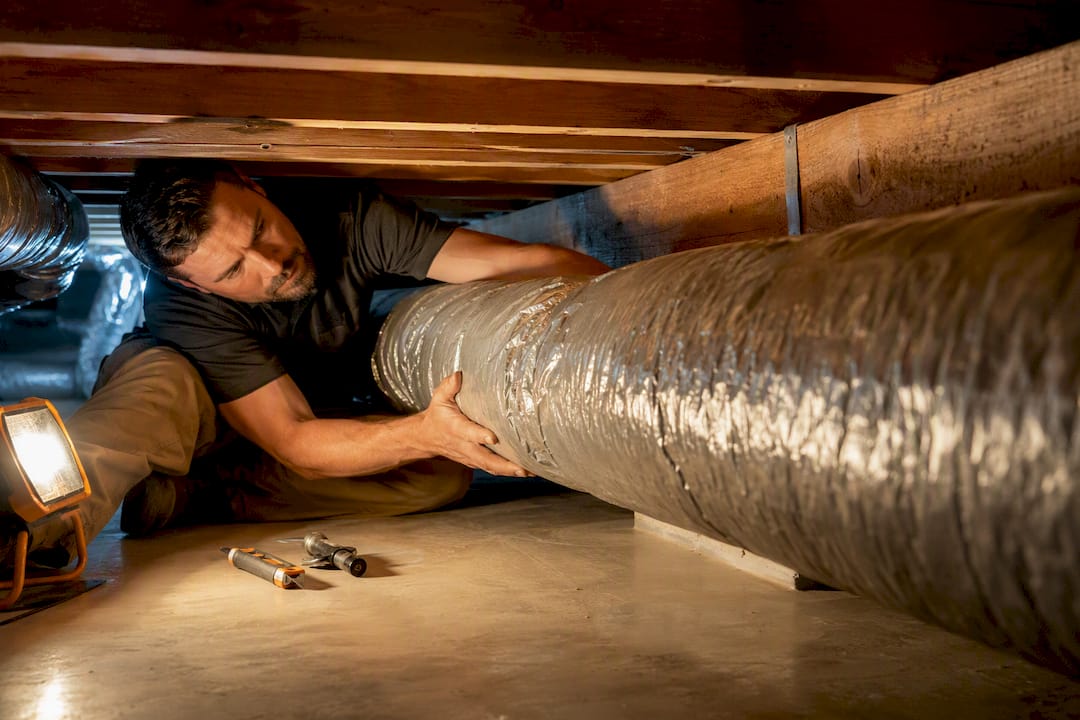 $7–$62 Per Foot Ductwork Replacement Cost in LA and Hidden Fees ductwork replacement cost ductwork replacement cost 1789036319169 Installer guiding ductwork through a tight crawlspace Installer guiding ductwork through a tight crawlspace